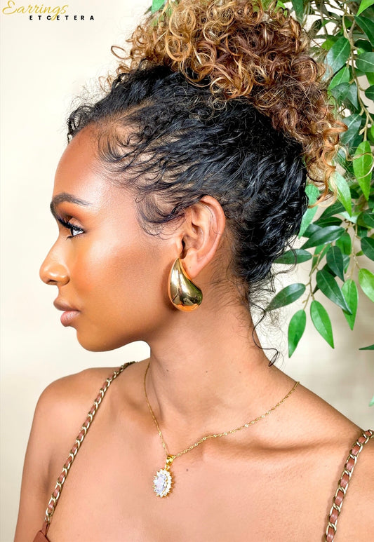TEAR DROP STATEMENT EARRINGS